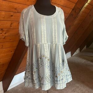 Embellished, beautiful babydoll lined top sold by Anthropologie